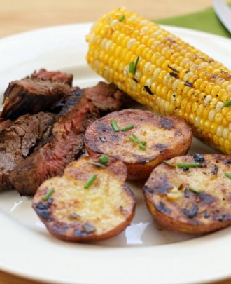 Grilled Flank Steak with Butter Chive Grilled Potatoes