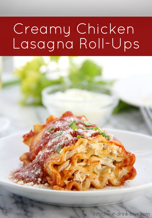 Creamy Chicken Lasagna Roll-Ups on a plate with tomato sauce