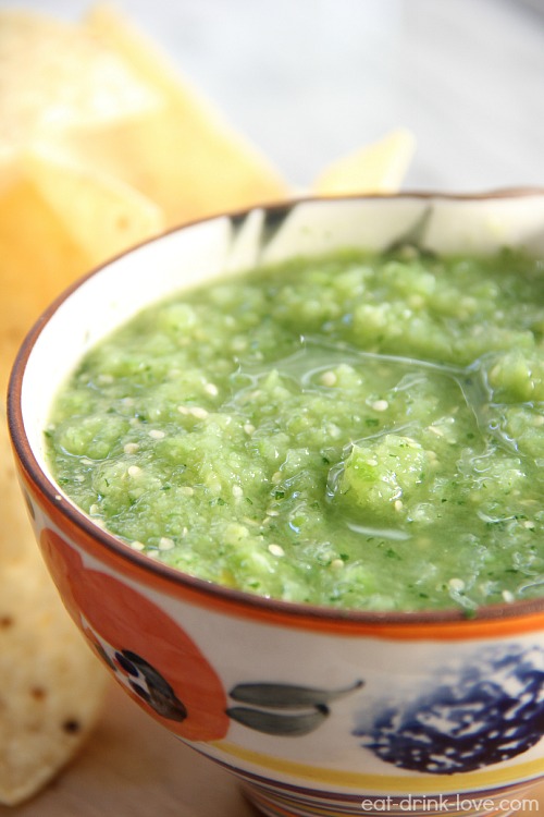 Salsa Verde in a floral bowl with tortilla chips