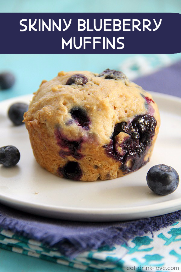 Skinny Blueberry Muffins on a plate with purple and blue napkins