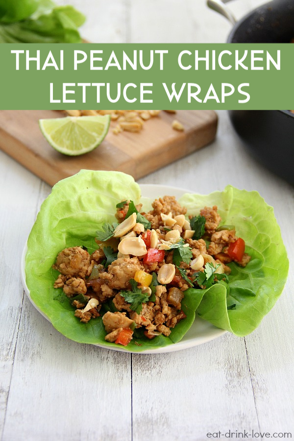 Thai Peanut Chicken Lettuce Wraps on a plate with peanuts and lime slices