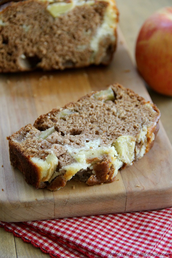 Apple Cinnamon Cream Cheese Bread sliced on a wooden board