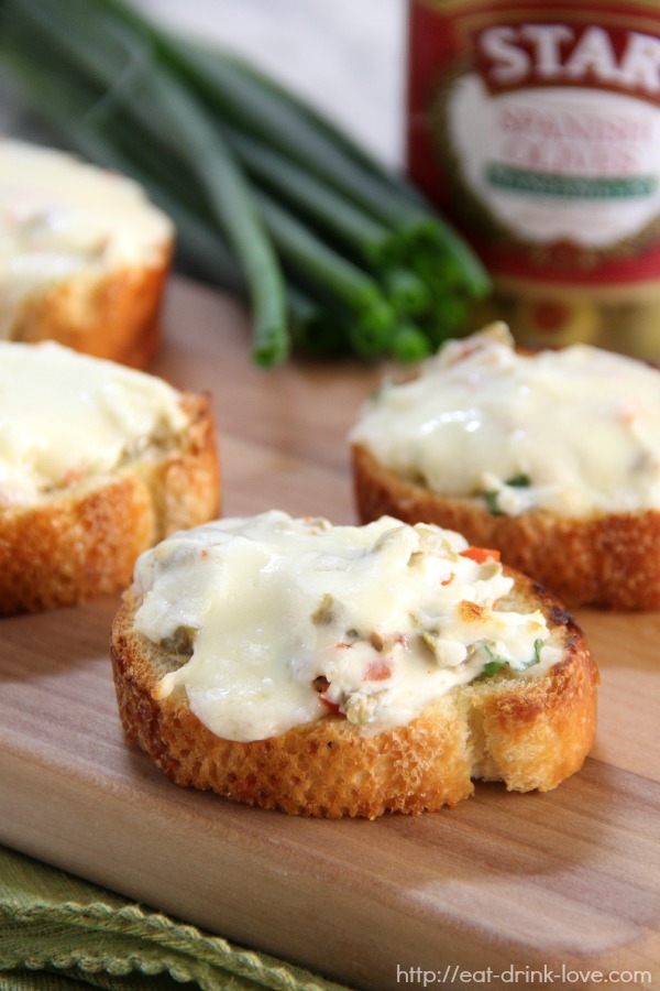 Cheesy Olive Toasts on serving board