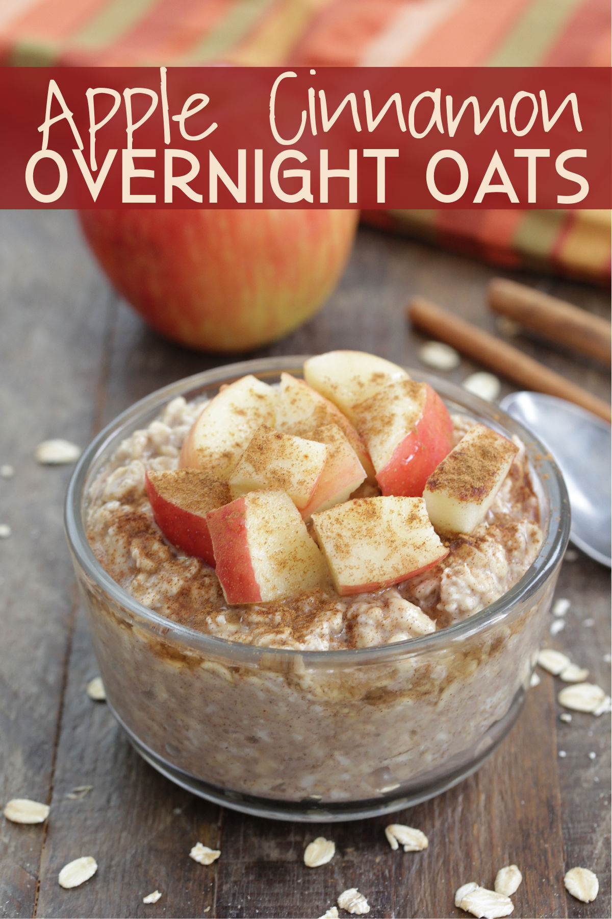 Apple Cinnamon Overnight Oats in a glass jar with diced apples and cinnamon on top
