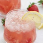 Strawberry Lemon Rosé in glasses with lemon slices and strawberries