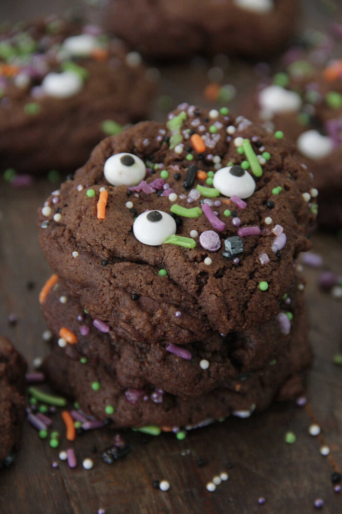 Stacked Chocolate Monster Eye Cookies with sprinkles and candy eyes